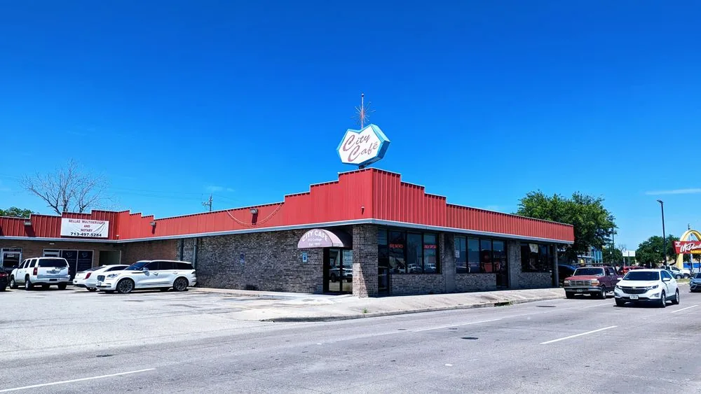 Street view of City Cafe at 513 College Ave in South Houston, Texas, with parking out front