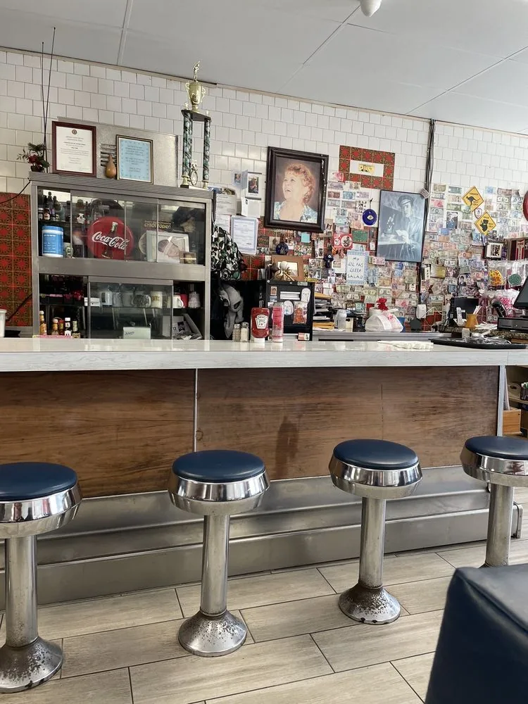 The front counter and stools inside City Cafe in South Houston, Texas