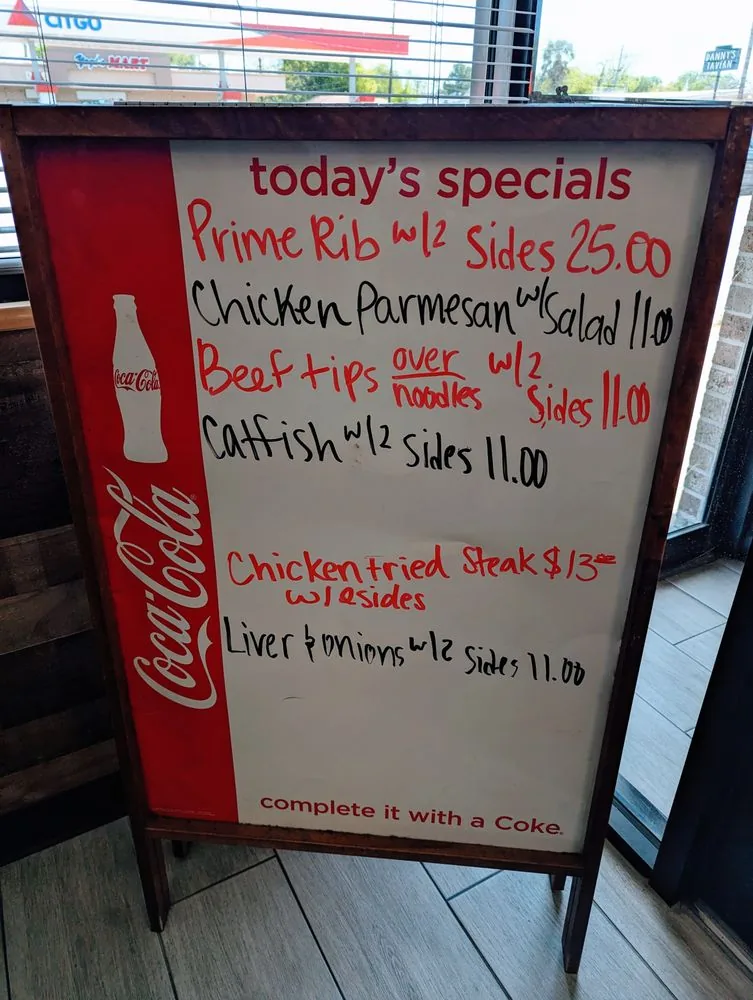 The handwritten daily specials board at City Cafe in South Houston